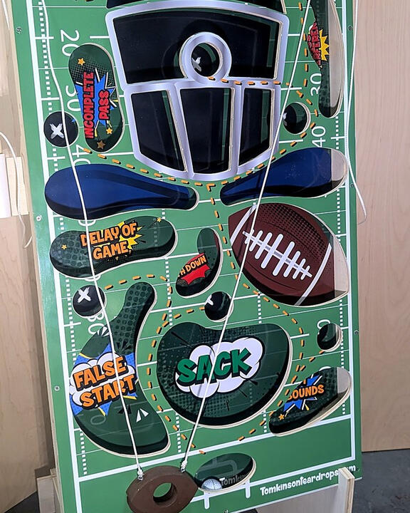 Get Vertical: Football board at an angle on its stand